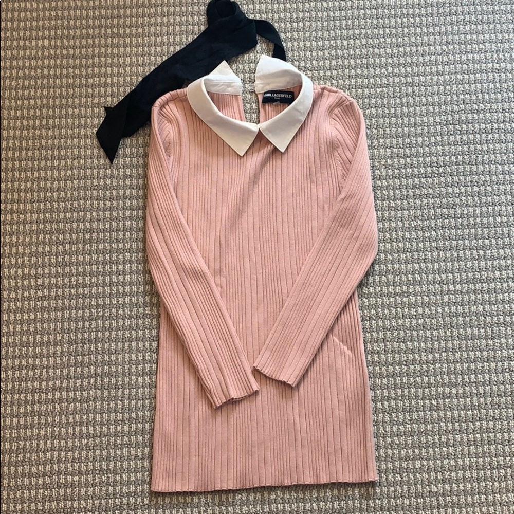 Pink top with pearl and bow detail